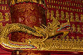 Luang Prabang, Laos - Wat Mai, wooden trough used for the ceremonial cleaning of Buddha statue. 